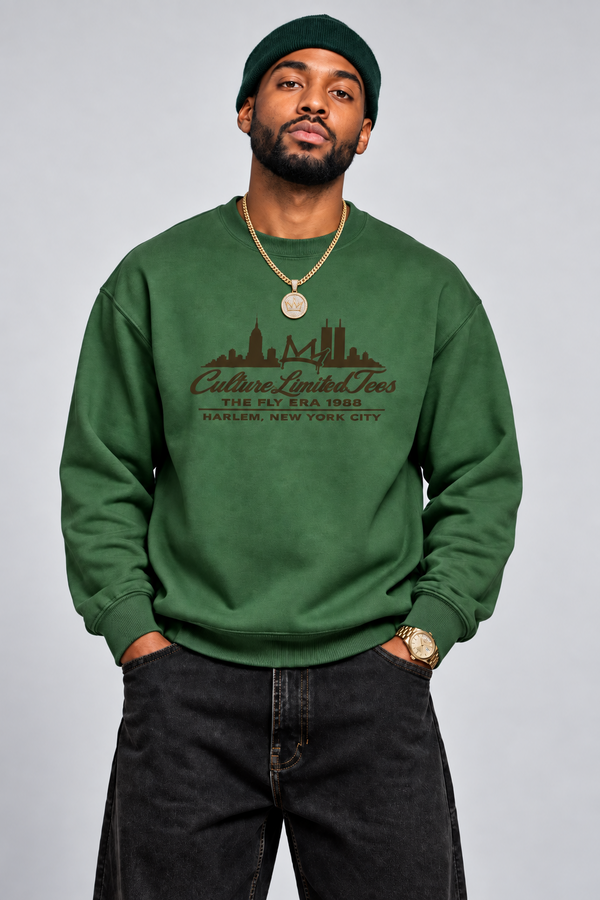 Model wearing Culture Limited Fly Era 1988 Beef and Broccoli forest green premium crewneck with brown Harlem NYC crown graphic