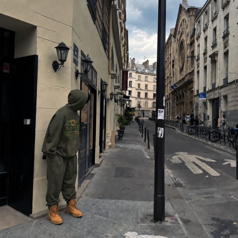 Culture Limited olive hoodie editorial street scene in Paris for From Harlem to Paris