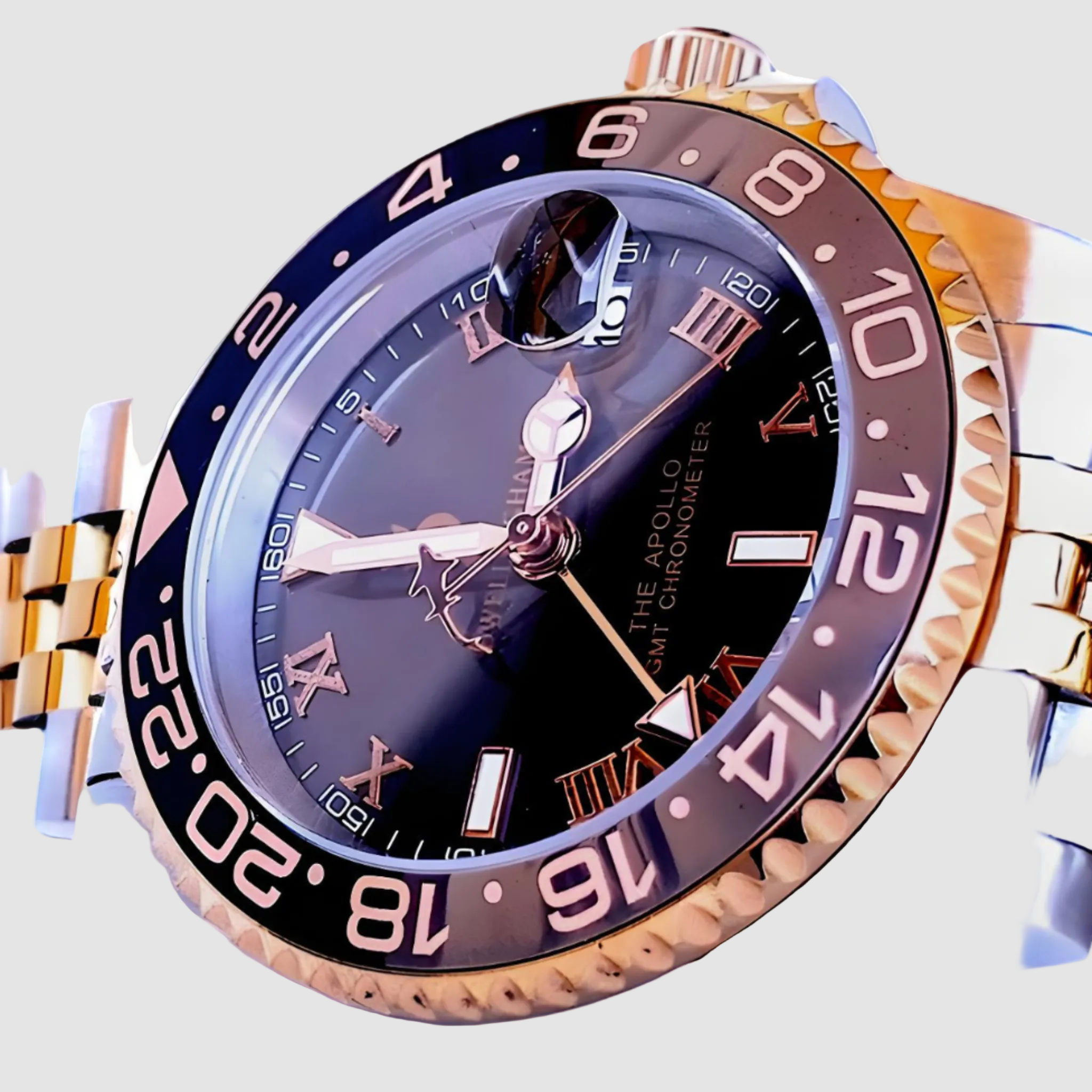 Luxury watch with a gold and silver band on a white background