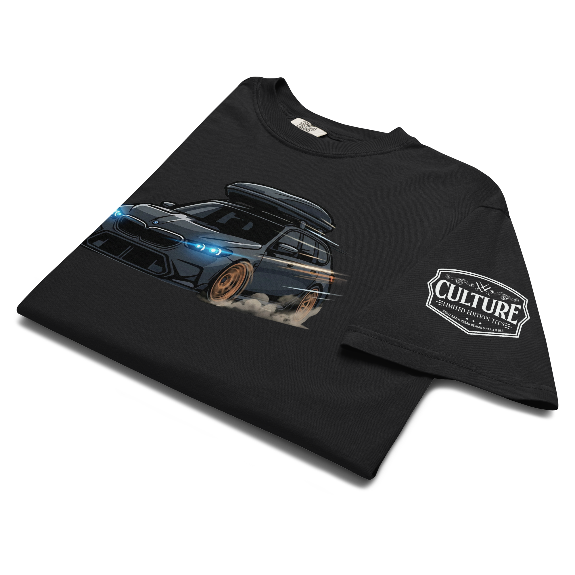 Close-up of the Culture Limited Tees logo printed on the left sleeve of the heavyweight cotton shirt.