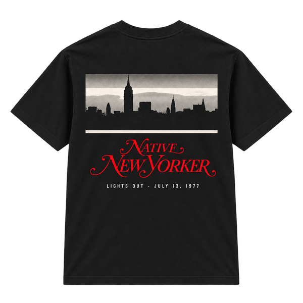 Native New Yorker Blackout black tee, flat back view with Manhattan skyline and red lettering